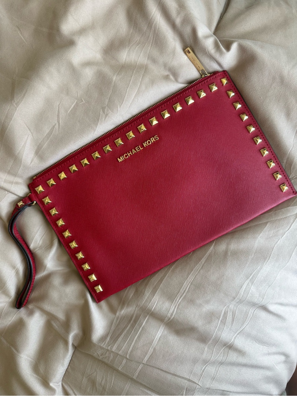 Michael Kors Jet Set Travel XL zip stud clutch wristlet